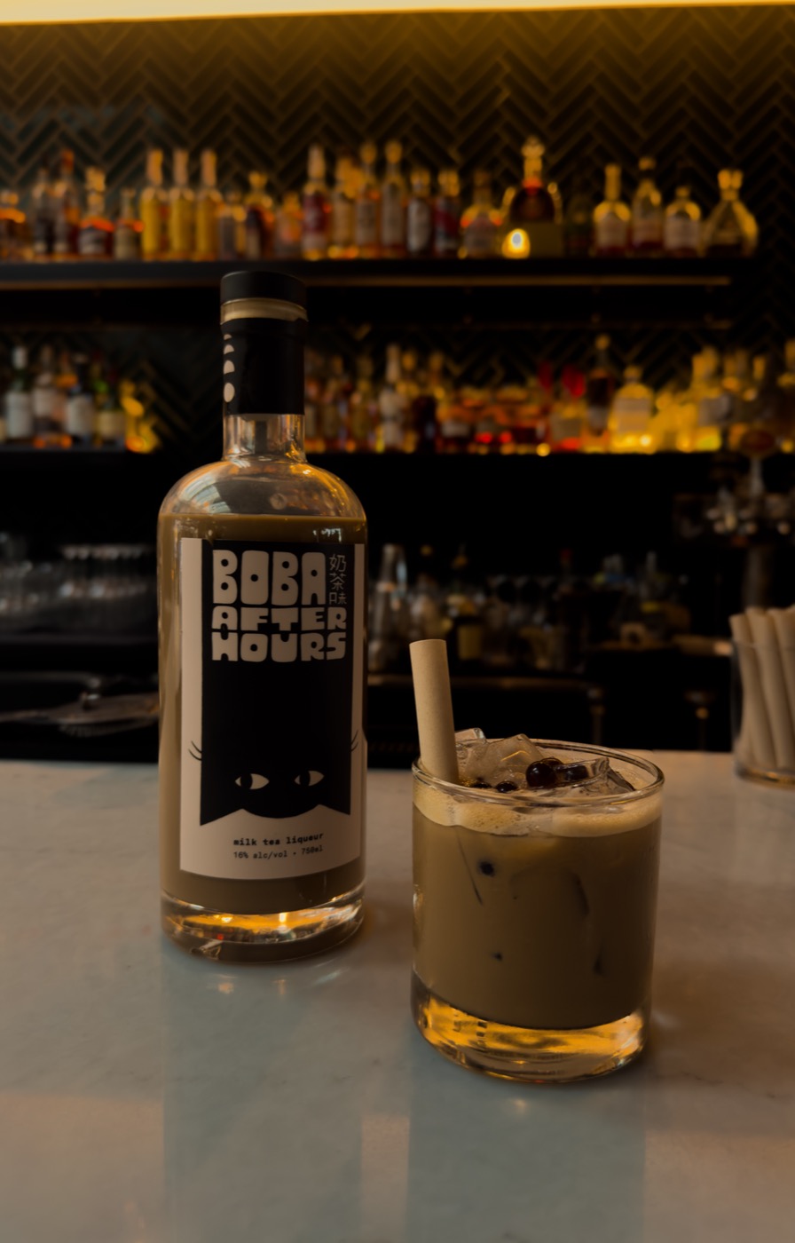 A Boba After Hours cocktail served over ice at a bar